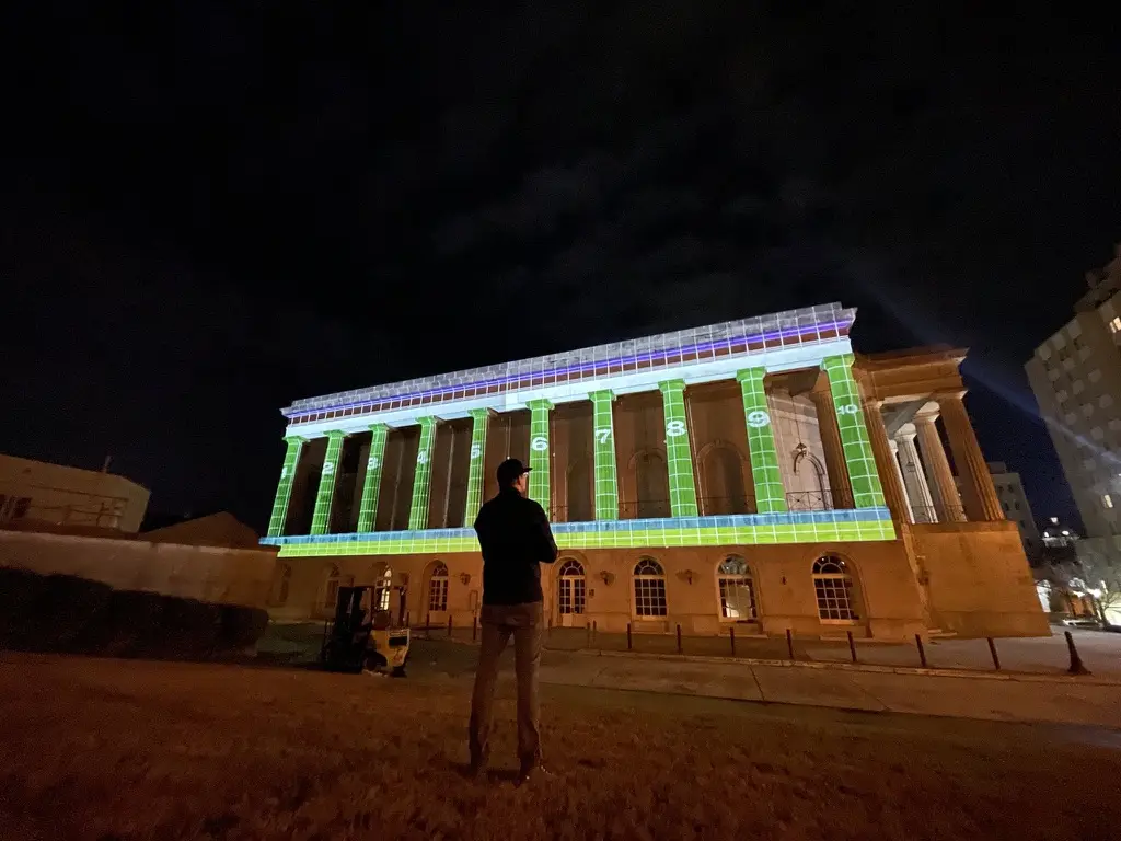Outdoor projection mapping on a landmark building at night